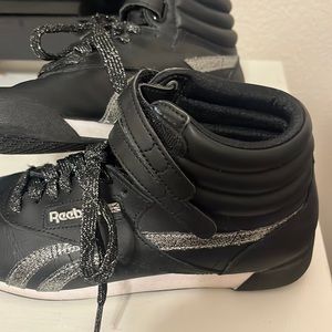 Black and silver Reebok